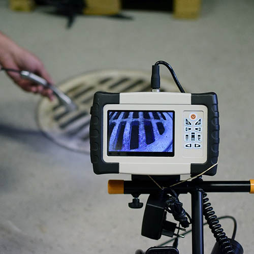 Man start using sewer inspection camera.